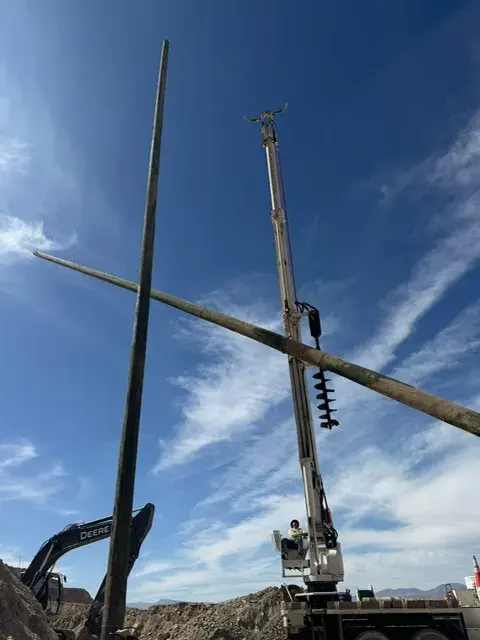 Utility pole crossarm and overhead conductors