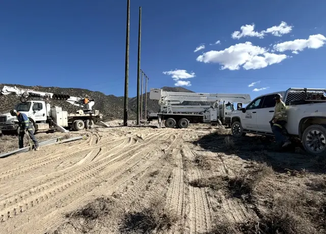 Equipment and vehicles beside overhead line structures